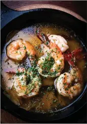  ?? KRESCENT CARASSO ?? Gambas al ajillo, or shrimp with garlic, guindilla pepper, sherry vinegar, lemon and parsley, is a popular menu item.