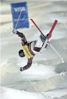  ?? RICK BOWMER/AP ?? Mikael Kingsbury competes in the men’s World Cup freestyle moguls event Thursday in Park City, Utah. Kingsbury went on to win — his 13th straight victory on the World Cup circuit.