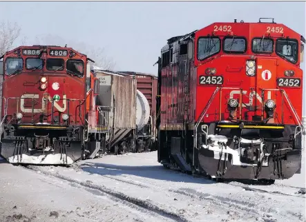  ?? THE CANADIAN PRESS ?? CN and CP say a brutal winter has led to malfunctio­ning switches and icy tracks, which force them to slow down and run trains with fewer cars to ensure safety. But a group of rail shippers isn’t buying it, arguing that, the ability to meet demand comes...