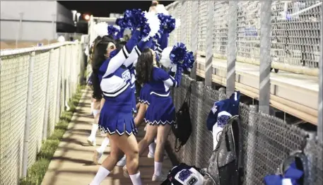  ?? PHOTO TOM BODUS ?? Central Union cheerleade­rs were present, but rather confined, at the Spartans’ home football contest Friday night against the Calexico Bulldogs. Cheer squads learned earlier in the day of a state rule clarificat­ion that would allow them to perform during the game.