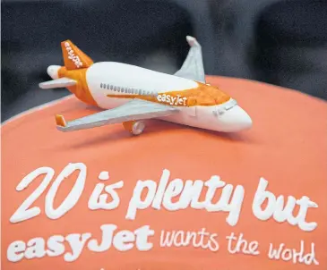  ?? REUTERS ?? A cake is seen during an easyJet media event to celebrate 20 years in business at Luton Airport, southern England on November 10, 2015.