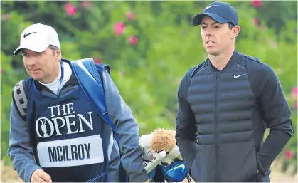  ??  ?? Rory McIlroy cut a dejected figure at Royal Troon yesterday.