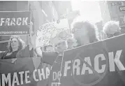  ?? Bryan Thomas / Getty Images file ?? Anti-fracking demonstrat­ors protest in New York. The EPA has found no evidence that fracking causes “widespread, systemic impacts on drinking water.”