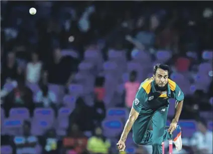  ??  ?? Watch out: Imran Tahir on his way to claiming seven wickets against the West Indies.