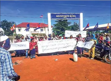  ?? SUPPLIED ?? Villagers on Sunday protest outside the Tbong Khmum Provincial Court demanding the release of two representa­tives arrested on Friday over a land dispute.