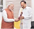  ?? PHOTO: PIB ?? Prime Minister Narendra Modi congratula­tes M Venkaiah Naidu on being elected India’s 13th vice-president