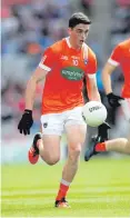  ??  ?? Top man: Armagh’s skipper Rory Grugan led by example, scoring 0-6