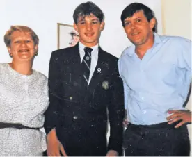  ??  ?? HIGH HOPES
Andrew in Celtic Boys’ Club suit with his mum and dad