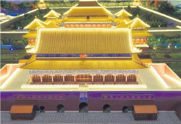 ??  ?? A miniature model of the Forbidden City in Beijing.