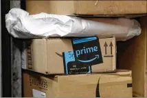  ?? MARK LENNIHAN / AP 2017 ?? Experts advise small business owners to offer small discounts on items that complement Amazon Prime Day deals.