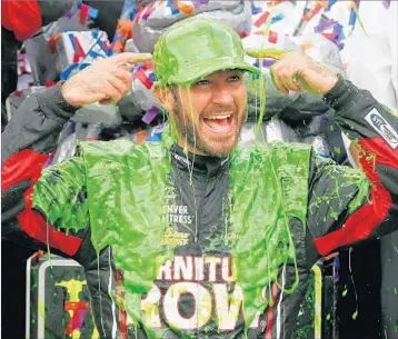  ?? BRIAN LAWDERMILK/GETTY ?? Martin Truex Jr., the top seed in the NASCAR playoffs, celebrates his win in Sunday’s Tales of the Turtles 400 in Joliet, Ill.