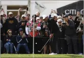  ?? RYAN KANG — THE ASSOCIATED PRESS ?? Tiger Woods chips to the third green during the second round of the Genesis Invitation­al at Riviera Country Club on Friday in the Pacific Palisades area of Los Angeles.