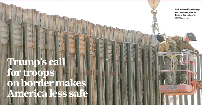  ?? AP FILES ?? Utah National Guard troops work to extend a border fence in San Luis, Ariz., in 2006.