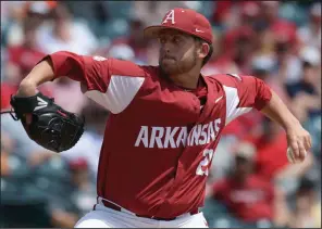  ?? NWA Democrat-Gazette/ANDY SHUPE ?? Pitcher Kacey Murphy was a freshman on the 2016 Arkansas baseball team that ended the season on a 13-game losing streak and missed the NCAA Tournament. “We definitely didn’t set the pace for the fans. We didn’t give them what they deserved,” Murphy said. “But we grew from that season, we bounced back, and we showed everyone we had the talent to do something good — to do this.”