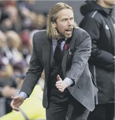  ??  ?? 0 Austin Macphee’s credential­s have been questioned but not by Hearts defender Michael Smith.