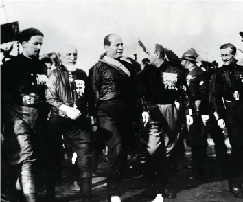  ?? ?? Rome in a day Fascist leader Benito Mussolini (centre) during the March on Rome in late October 1922. The day after Mussolini’s blackshirt­s amassed at the capital, King Victor Emmanuel III named him prime minister