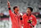  ?? Photograph: Alex Davidson/Getty Images ?? Gold medalist Misato Michishita poses after her medal ceremony.