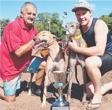  ?? Picture: KATRINA BRIDGEFORD ?? Russell Savige with two-year-old Sylvia's Monaro and fellow Darwin trainer Jamie Hosking with 2016 Greyhound of the Year and reigning Easter Cup champion Arnhen Villain