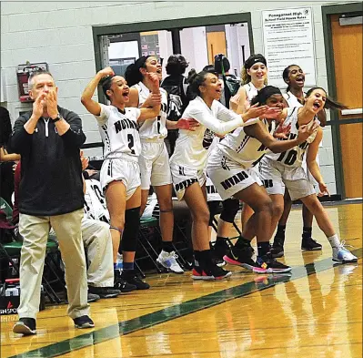  ??  ?? The No. 3 Woonsocket girls basketball team reacts to a big basket during Thursday night’s Division Pilgrim to secure the Villa Novans a spot in a division final for the first time since 2011.
III semifinal victory over