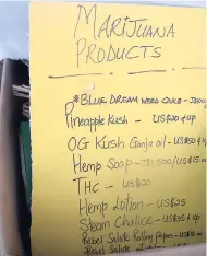  ??  ?? A list of some marijuana products, parapherna­lia and prices.