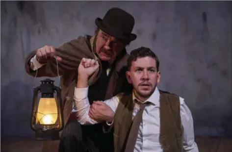  ?? ROGER MASTROIANN­I ?? Bradley Armacost and Adam Wesley Brown perform in the Cleveland Play House production of “Woman in Black.”