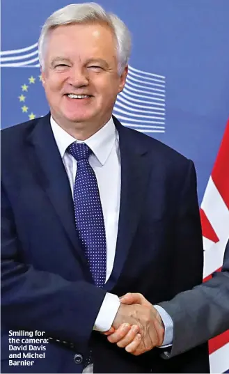  ??  ?? Smiling for the camera: David Davis and Michel Barnier