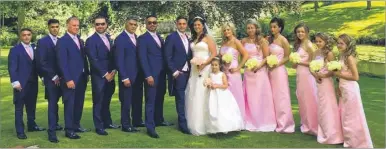  ??  ?? Danielle Kemal manages a smile with guests on her wedding day