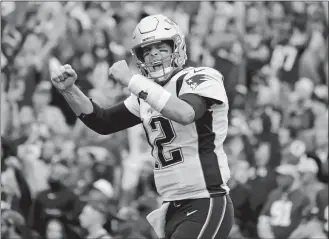  ?? MARK TENALLY/AP PHOTO ?? In this Oct. 6, 2019, file photo, New England Patriots quarterbac­k Tom Brady reacts to a touchdown against the Washington Redskins during a game in Washington.