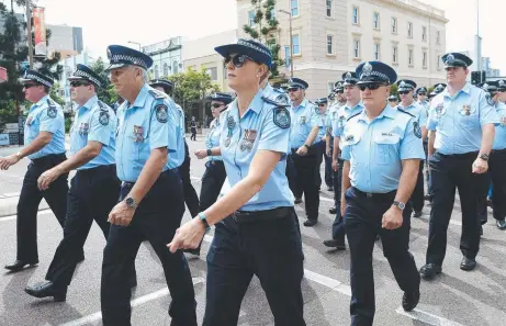  ?? BLUE FAMILY: Police march through the city yesterday as part of their National Remembranc­e Day. Picture: WESLEY MONTS ??