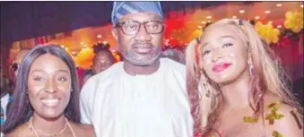  ??  ?? Otedola and his daughters, Tolani and DJ Cuppy
