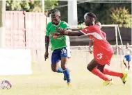  ?? FILE ?? Boys’ Town FC’s Shaquille Bradford (right) tries to stop Montego Bay United’s Dwayne Ambusley during a Red Stripe Premier League match at the Barbican Stadium on Sunday, January 28, 2018.