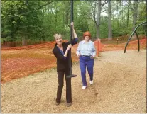  ?? PHOTOS BY BILL RETTEW - MEDIANEWS GROUP ?? Former Mayor and state Rep. Dianne Herrin, left, prepares to take a zipline ride as Mayor Lillian DeBaptiste watches.