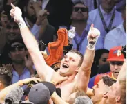  ?? Tertius Pickard / Associated Press ?? Jeff Horn (left) of Australia and Manny Pacquiao of the Philippine­s exchange punches during their WBO welterweig­ht title fight in Brisbane, Australia. Horn celebrates after the announceme­nt of his surprising unanimous decision over Pacquiao.