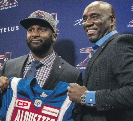  ?? DAVE SIDAWAY FILES ?? Montreal Alouettes general manager Kavis Reed, right, began his roster makeover when he acquired Darian Durant, left, who Reed brought in “to be a leader, not just a positional player,” after the club won just 13 of its 36 games over the last two...