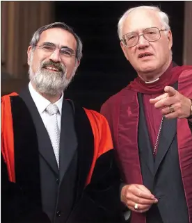  ??  ?? TRIBUTES: Rabbi Sacks with former Archbishop of Canterbury George Carey