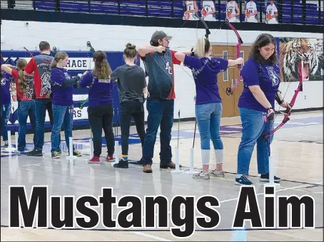  ?? Photo submited ?? Mustang Archery team members compete last season during a tournament at Carthage High School. Coaches and students are excited to see what this new season will bring.