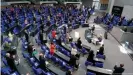  ??  ?? Lawmakers were spread out and without Chancellor Merkel during the debate