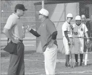  ?? GRAHAM THOMAS SPECIAL TO ENTERPRISE-LEADER ?? Farmington head coach Jay Harper argues with an umpire in the bottom of the second inning during Friday’s game at Siloam Springs. The Cardinals defeated the Panthers 4-0.