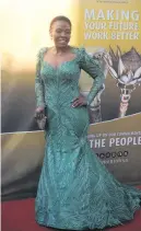  ??  ?? A VISION. Deputy Minister of Communicat­ions Pinky Kekana in glamorous green.