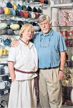  ??  ?? Brigitte and David Birch at their ceramics studio. Below, Mr Birch with the Persian rug he thinks caused the account closure