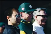  ?? KARL MONDON — BAY AREA NEWS GROUP, FILE ?? A’s manager Bob Melvin is flanked by team president Dave Kaval and executive vice president Billy Beane during spring training in February 2019 in Mesa, Ariz.