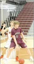  ?? MARK HUMPHREY ENTERPRISE-LEADER ?? Caleb Hale, a 6-4 junior, backs in with the dribble against Gravette. The Wolves were eliminated from the District 4A-1 boys basketball tournament they hosted last week by Gravette, 57-48, despite 10 points by Hale on Feb. 13.