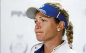  ?? CHARLIE NIEBERGALL - THE ASSOCIATED PRESS ?? Europe’s Suzann Pettersen, of Norway, looks on during a news conference for the Solheim Cup golf tournament, Wednesday, in West Des Moines, Iowa. Pettersen has pulled out of this weekend’s Solheim Cup because of a back injury.