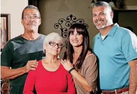  ?? [PHOTO BY CORY YOUNG, TULSA WORLD] ?? Javier Flores, of Edmond, right, stands with his sister, Rose Flores Winters, of Tulsa, and his mother, Rosa Rivera, and father in-law Andres Vargas. Flores, who works for Flintco, says his constructi­on company paid for his mother and father in-law to...