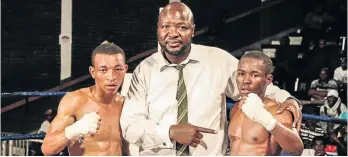  ?? / SUPPLIED ?? Promoter Ayanda Matiti is flanked by young boxing prospects Sabelo Nkosi, left, and Ntlantla Tyira at Orient Theatre recently.