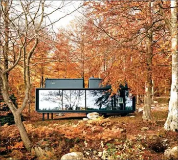  ?? VIPP HOTEL VIA THE NEW YORK TIMES ?? The Vipp shelter at Lake Immeln in Sweden in a photo provided by the hotel. Travellers are swapping standard hotel rooms for new interpreta­tions of traditiona­l lodgings like the Vipp.