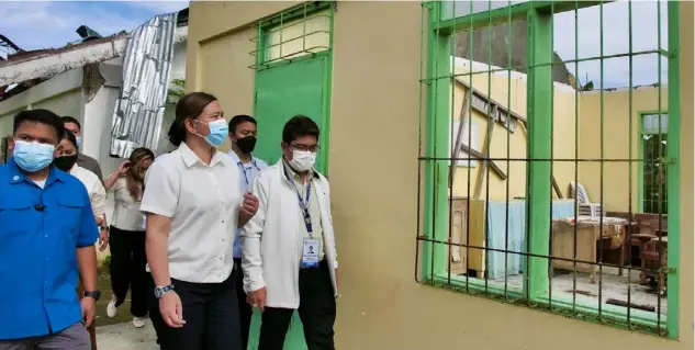  ?? PHOTOGRAPH COURTESY OF INDAY SARA DUTERTE FACEBOOK PAGE ?? VICE PRESIDENT and Education Secretary Sara Duterte inspects a school damaged by typhoon ‘Odette’ last year during her visit to Bohol province Friday.