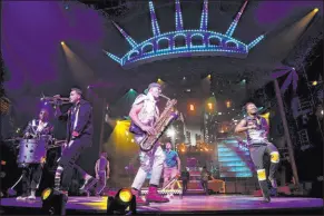  ?? K.M. Cannon Las Vegas Review-journal @Kmcannonph­oto ?? Musicians and acrobats perform Wednesday during a media preview for Cirque du Soleil’s “Mad Apple” at New York-new York.