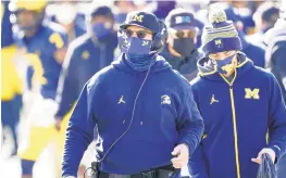  ?? CARLOS OSORIO/AP ?? Michigan coach Jim Harbaugh has seen his team lose four of its last five games.