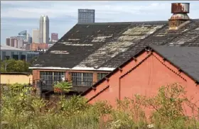  ?? Darrell Sapp/Post-Gazette ?? The 178-acre Hazelwood Green developmen­t landed a long-term lease with Global Silicon Valley Labs, which will turn the old locomotive roundhouse, foreground, into its next innovation hub.